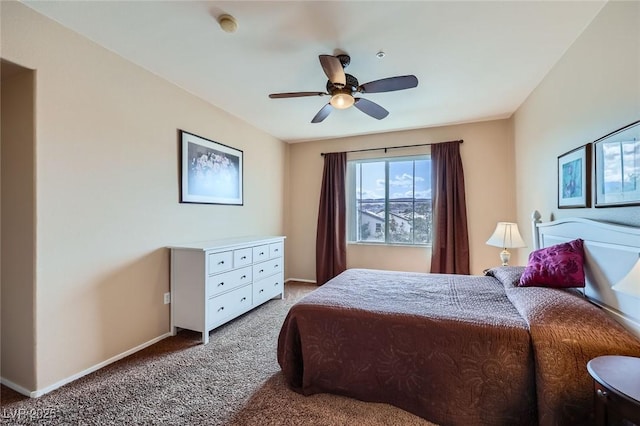 bedroom featuring a ceiling fan, carpet, and baseboards