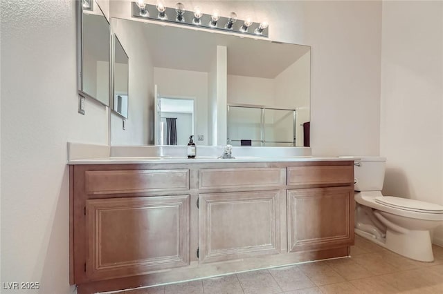 bathroom with toilet, a stall shower, tile patterned flooring, and vanity