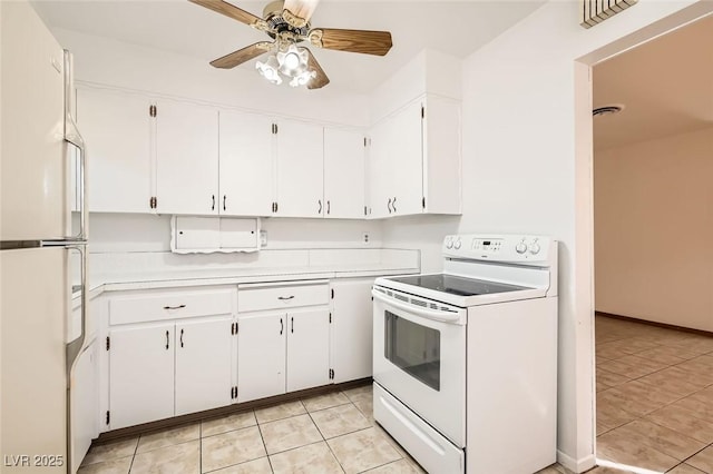 422 Ilmenite Way, Henderson, NV 89015 - kitchen featuring white cabinetry, light countertops, ceiling fan, and white appliances