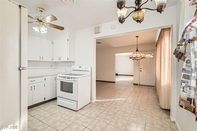 422 Ilmenite Way, Henderson, NV 89015 - kitchen with white appliances, white cabinetry, light countertops, and ceiling fan with notable chandelier