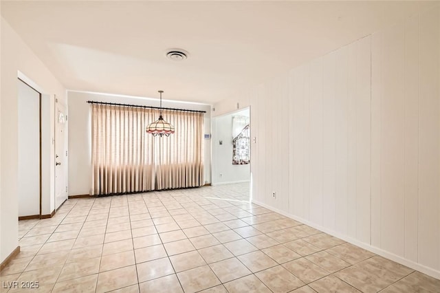 422 Ilmenite Way, Henderson, NV 89015 - empty room featuring light tile patterned flooring, baseboards, and visible vents