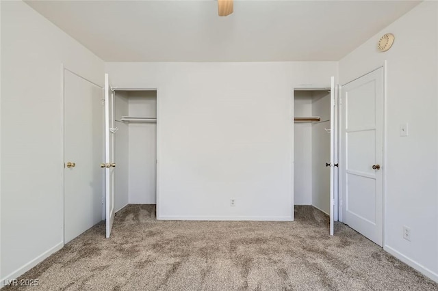 422 Ilmenite Way, Henderson, NV 89015 - unfurnished bedroom featuring carpet flooring, multiple closets, and ceiling fan