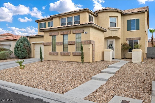 489 Wendover Hills Ave, Las Vegas, NV 89123 - view of front facade featuring stucco siding, driveway, a tiled roof, and a garage