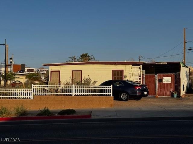 view of front of home with fence