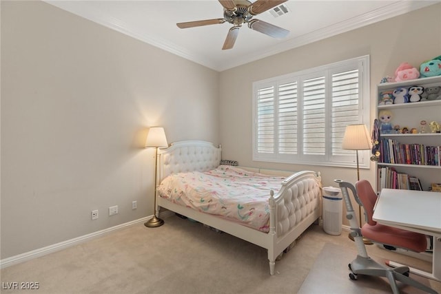 carpeted bedroom with baseboards, visible vents, crown molding, and ceiling fan