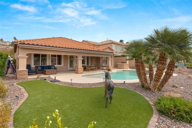 back of property featuring a patio, a fenced in pool, an outdoor living space, a tile roof, and stucco siding