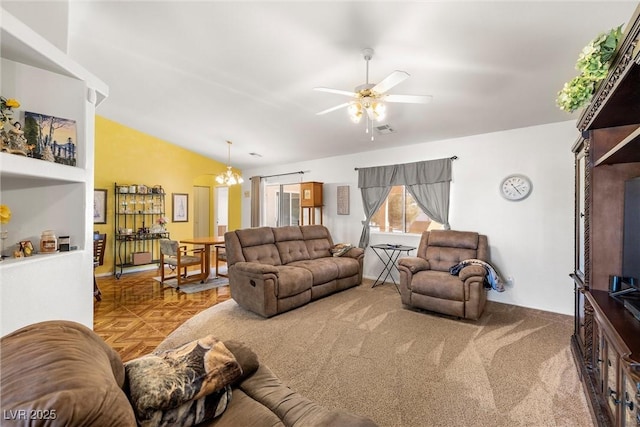 living room featuring arched walkways, visible vents, vaulted ceiling, and ceiling fan