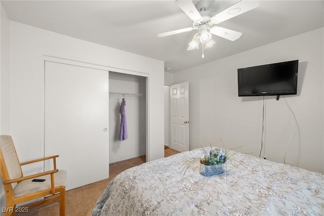 bedroom featuring carpet floors, ceiling fan, and a closet
