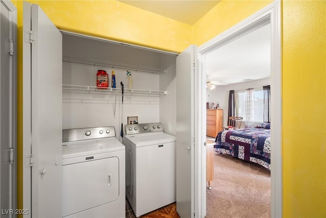 laundry area featuring washer and dryer, laundry area, ceiling fan, and carpet floors