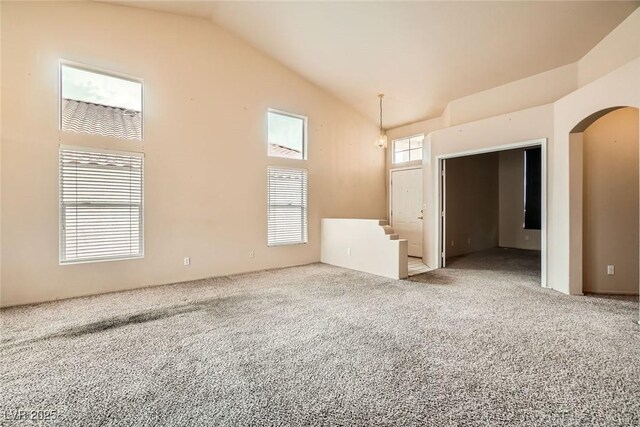 9532 Calico Garden Ave, Las Vegas, NV 89134 - carpeted spare room with arched walkways and vaulted ceiling