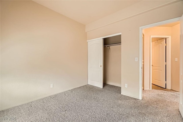 9532 Calico Garden Ave, Las Vegas, NV 89134 - unfurnished bedroom featuring carpet flooring, a closet, and baseboards