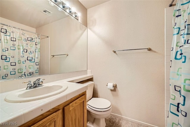9532 Calico Garden Ave, Las Vegas, NV 89134 - bathroom featuring toilet, vanity, a shower with shower curtain, and tile patterned floors