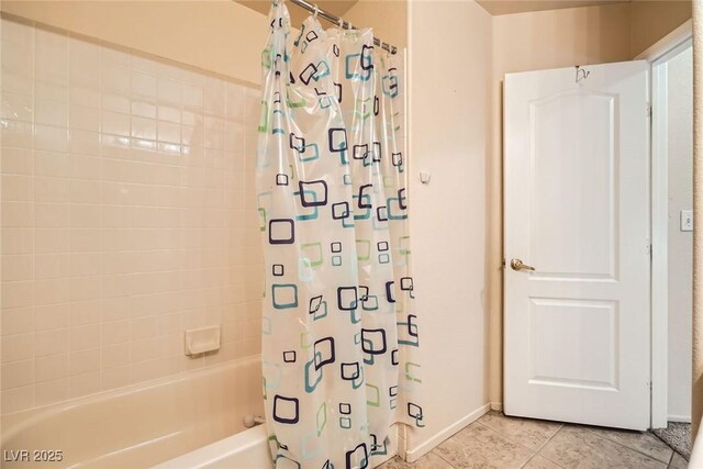 9532 Calico Garden Ave, Las Vegas, NV 89134 - bathroom with shower / bathtub combination with curtain, tile patterned flooring, and baseboards