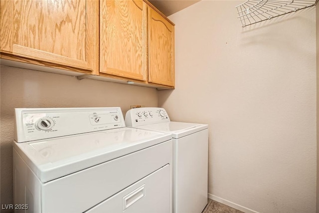 9532 Calico Garden Ave, Las Vegas, NV 89134 - laundry area featuring washing machine and clothes dryer, cabinet space, and baseboards