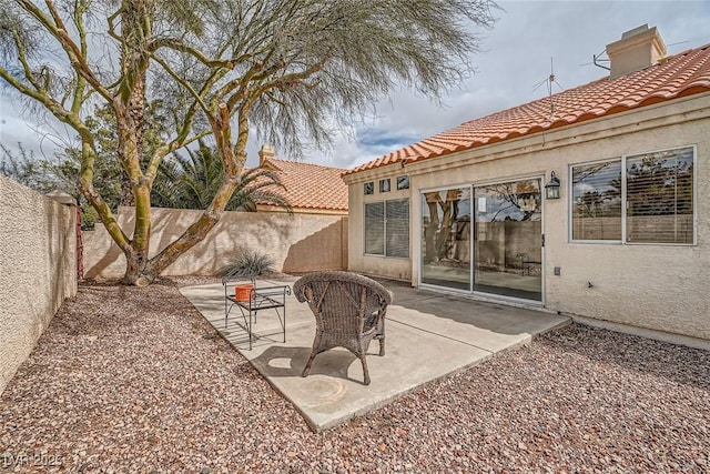 9532 Calico Garden Ave, Las Vegas, NV 89134 - fenced backyard featuring a patio area