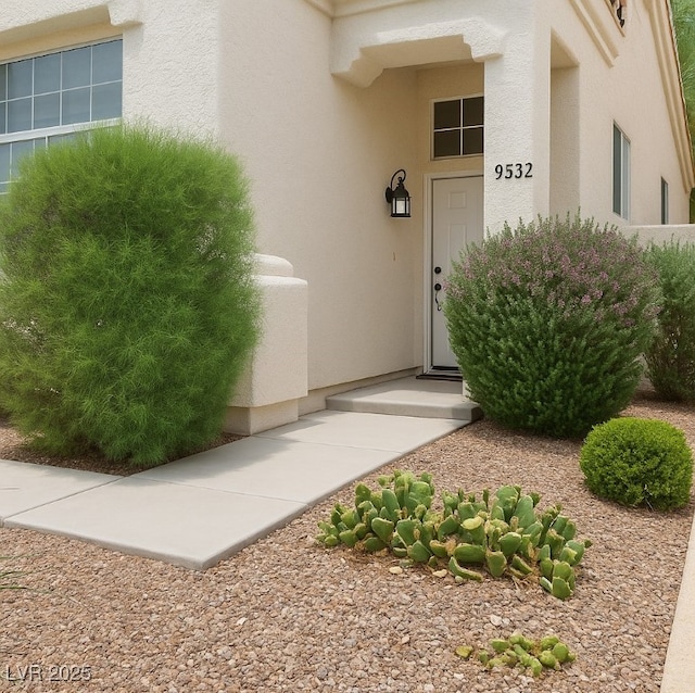 9532 Calico Garden Ave, Las Vegas, NV 89134 - view of exterior entry featuring stucco siding