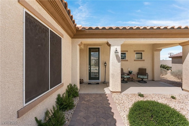 2606 Crested Butte St, Henderson, NV 89052 - entrance to property featuring stucco siding