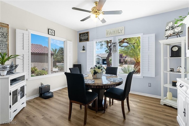 2606 Crested Butte St, Henderson, NV 89052 - dining space featuring a ceiling fan, plenty of natural light, and wood finished floors