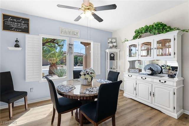 2606 Crested Butte St, Henderson, NV 89052 - dining space with a ceiling fan, baseboards, and light wood-style flooring