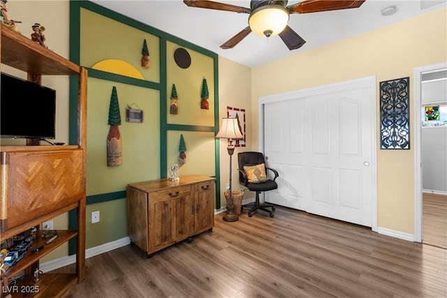 2606 Crested Butte St, Henderson, NV 89052 - living area with baseboards, a ceiling fan, and wood finished floors
