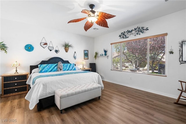 2606 Crested Butte St, Henderson, NV 89052 - bedroom with baseboards, ceiling fan, wood finished floors, and visible vents