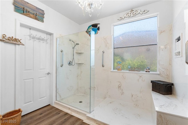 2606 Crested Butte St, Henderson, NV 89052 - full bath featuring a marble finish shower, plenty of natural light, and wood finished floors