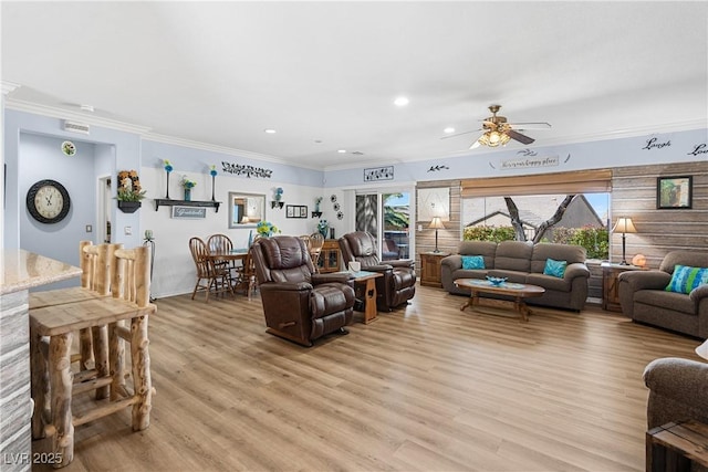 2606 Crested Butte St, Henderson, NV 89052 - living area featuring ceiling fan, visible vents, crown molding, light wood-type flooring, and recessed lighting