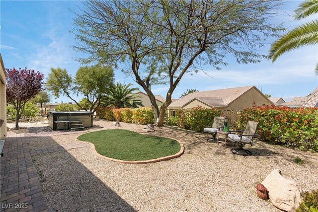 2606 Crested Butte St, Henderson, NV 89052 - view of yard with a hot tub, a patio, and fence