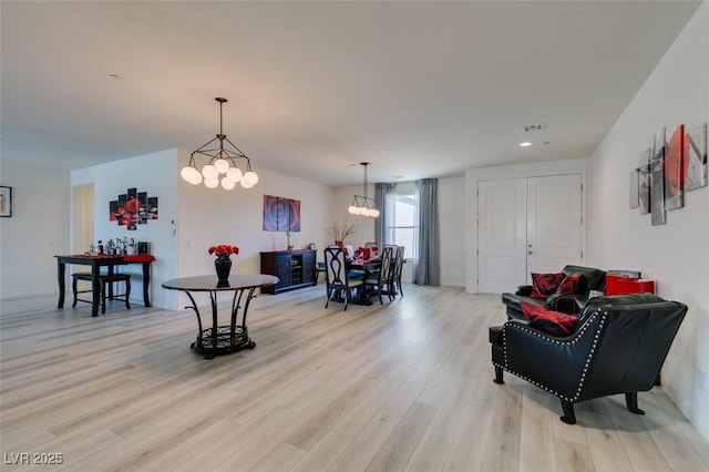8637 Home Gate Ct, Las Vegas, NV 89113 - living room with light wood-type flooring, a chandelier, and recessed lighting