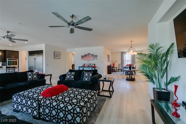8637 Home Gate Ct, Las Vegas, NV 89113 - living area featuring ceiling fan, light wood-style flooring, a chandelier, and recessed lighting