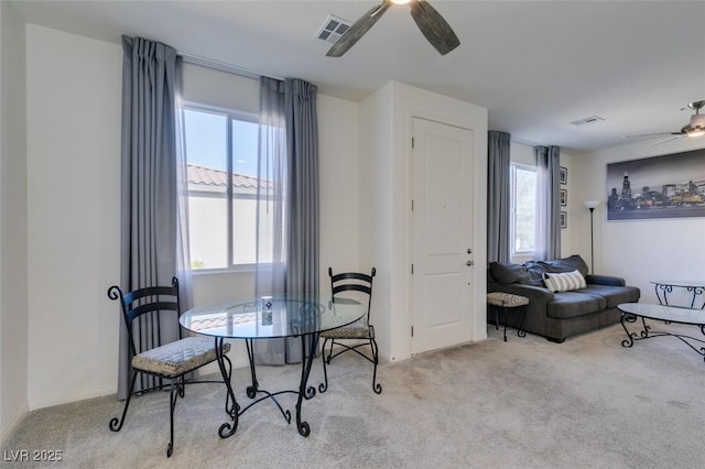 8637 Home Gate Ct, Las Vegas, NV 89113 - dining room with a ceiling fan, carpet, plenty of natural light, and baseboards