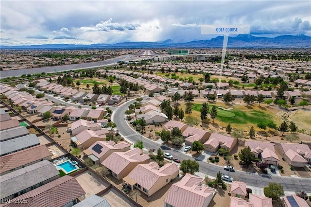 7460 Chaffinch St, North Las Vegas, NV 89084 - aerial perspective of suburban area with mountains