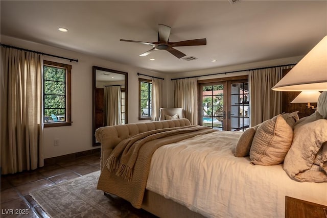 bedroom with recessed lighting, french doors, baseboards, access to exterior, and dark tile patterned floors