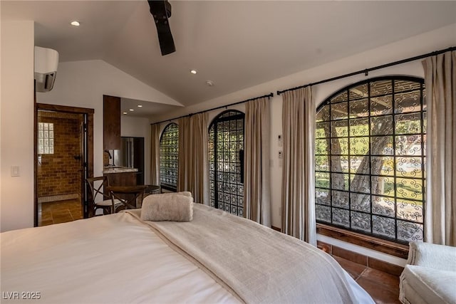 bedroom featuring lofted ceiling, tile patterned floors, recessed lighting, and a wall unit AC