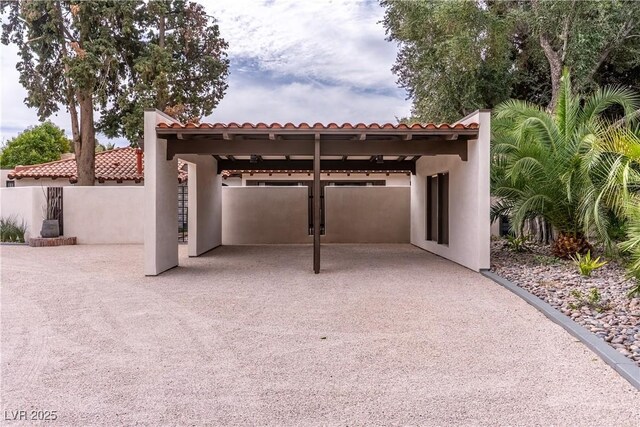view of patio featuring fence