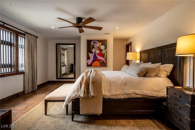 tiled bedroom featuring baseboards, recessed lighting, and a ceiling fan