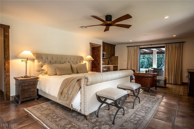 bedroom with a sink, recessed lighting, and ceiling fan
