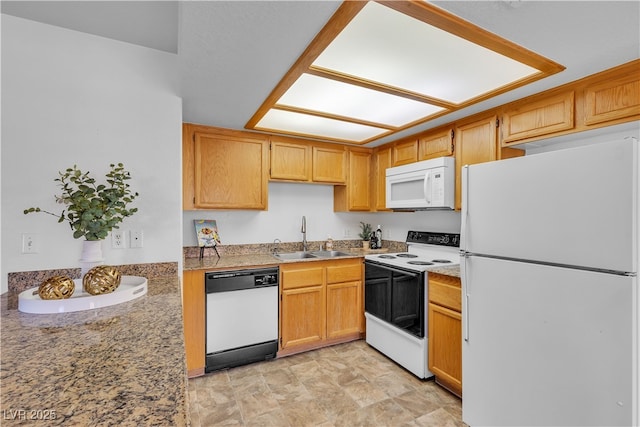 8410 Eldora Ave Unit 2045, Las Vegas, NV 89117 - kitchen featuring white appliances and stone finish floors