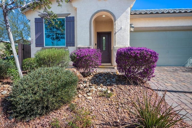 4032 Little Bay Ave, North Las Vegas, NV 89081 - entrance to property with stucco siding and an attached garage