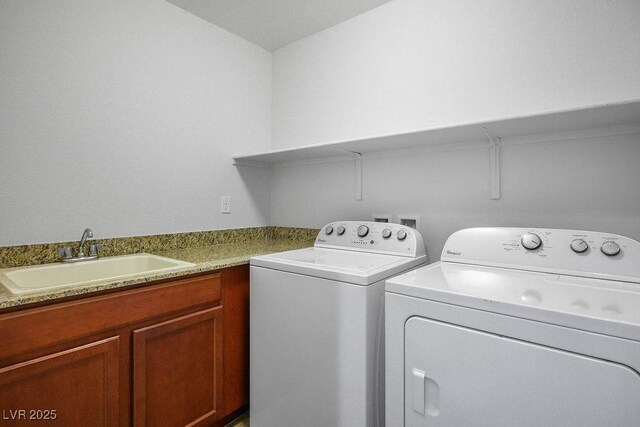 4032 Little Bay Ave, North Las Vegas, NV 89081 - laundry room with independent washer and dryer and cabinet space
