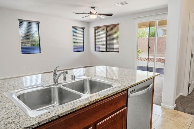 4032 Little Bay Ave, North Las Vegas, NV 89081 - kitchen featuring a sink, dishwasher, a ceiling fan, light tile patterned flooring, and light stone counters