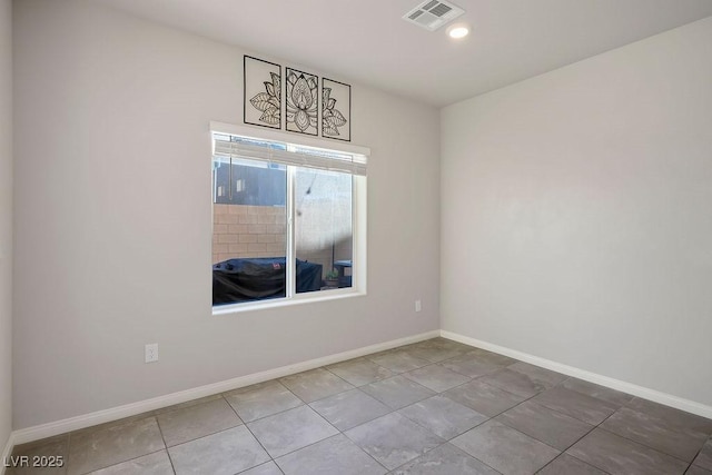 9871 Magnus Ct, Las Vegas, NV 89178 - unfurnished room with tile patterned flooring and baseboards