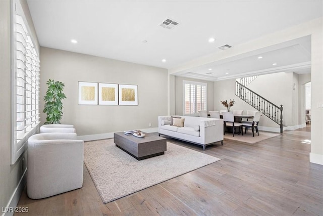 6335 Mount Eden Ave, Las Vegas, NV 89139 - living area with stairway, baseboards, wood finished floors, and recessed lighting