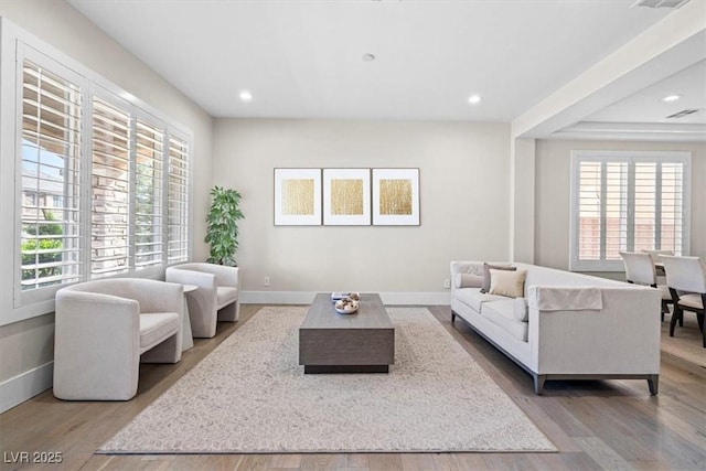 6335 Mount Eden Ave, Las Vegas, NV 89139 - living area featuring healthy amount of natural light, wood finished floors, baseboards, and recessed lighting