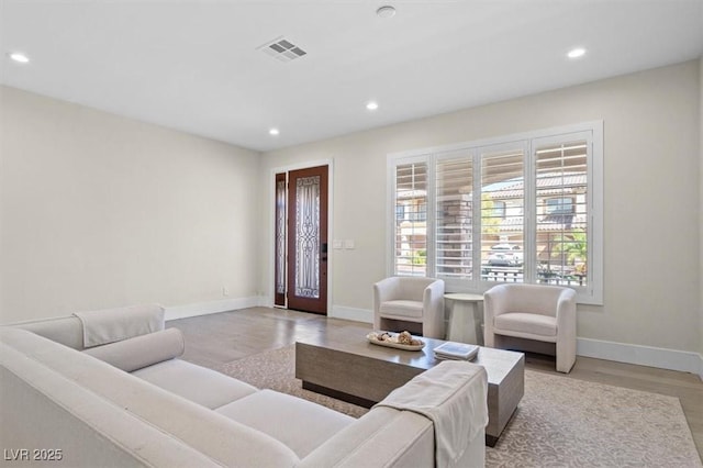 6335 Mount Eden Ave, Las Vegas, NV 89139 - living area featuring wood finished floors, recessed lighting, and baseboards