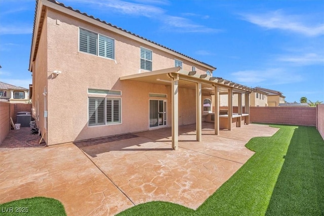 6335 Mount Eden Ave, Las Vegas, NV 89139 - back of house featuring stucco siding and a patio