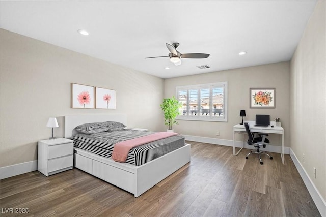 6335 Mount Eden Ave, Las Vegas, NV 89139 - bedroom with wood finished floors, an office area, baseboards, and recessed lighting