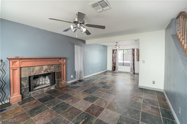 2812 Shadow Creek Cir, Las Vegas, NV 89117 - unfurnished living room with baseboards, visible vents, ceiling fan, and stone tile flooring