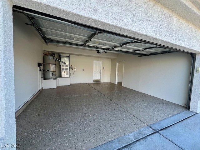 garage with heating unit and secured water heater