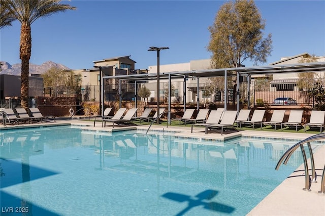 community pool featuring fence